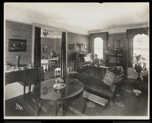 A Man Playing the Piano in a Living Room of the A.C. Cronin Residence